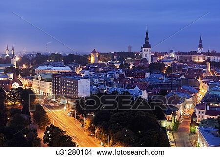 Elevated view of illuminated city at dusk View Large Photo Image Picture - Elevated view of illuminated city at dusk. Fotosearch