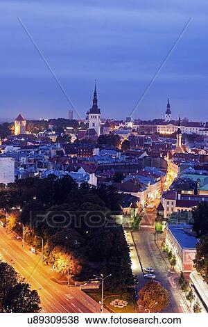 Elevated view of illuminated city at dusk View Large Photo Image Stock Photo - Elevated view of illuminated city at dusk. Fotosearch