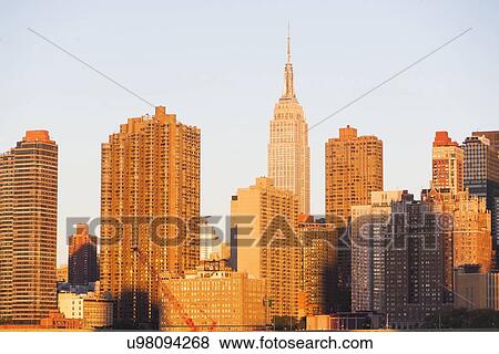 Stock Photo - Empire State Building at sunset. Fotosearch