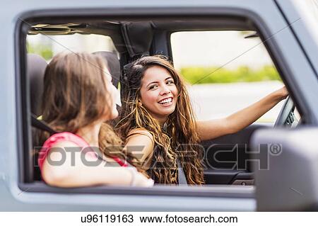 Female friends (14-15) during road trip View Large Photo Image Stock Image - Female friends (14-15) during road trip. Fotosearch