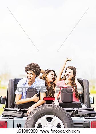Group of friend (14-15) during road trip View Large Photo Image Stock Image - Group of friend (14-15) during road trip. Fotosearch