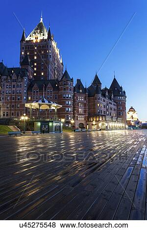 Stock Photo - Illuminated Chateau Frontenac seen from boardwalk. Fotosearch