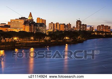Illuminated cityscape at dusk View Large Photo Image Picture - Illuminated cityscape at dusk. Fotosearch