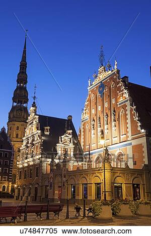 Illuminated House of the Blackheads and St. Peter's Church against blue sky View Large Photo Image Stock Photography - Illuminated House of the Blackheads and St. Peter's Church against blue sky. Fotosearch