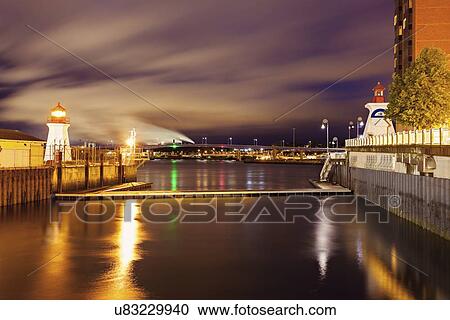 Illuminated Saint John Coast Guard Base Lighthouse seen from harbor View Large Photo Image Stock Image - Illuminated Saint John Coast Guard Base Lighthouse seen from harbor. Fotosearch