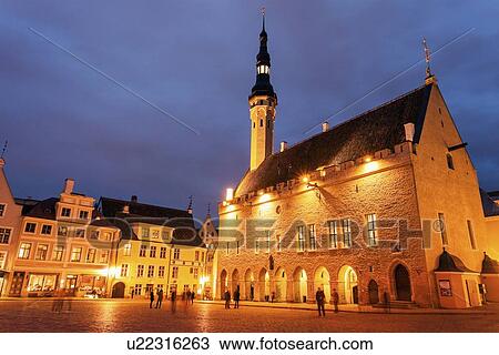 Illuminated Town Hall seen from across square at dusk View Large Photo Image Stock Image - Illuminated Town Hall seen from across square at dusk. Fotosearch