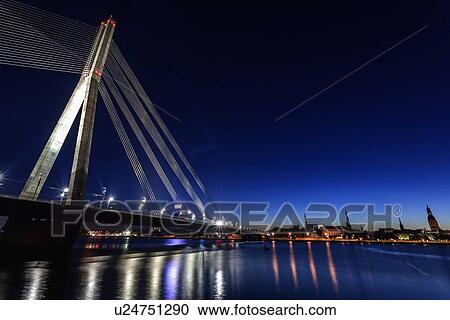 Illuminated Vansu Bridge reflecting in river View Large Photo Image Stock Image - Illuminated Vansu Bridge reflecting in river. Fotosearch