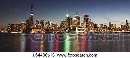 Illuminated waterfront skyline reflecting in Lake Ontario View Large Photo Image Stock Image - Illuminated waterfront skyline reflecting in Lake Ontario. Fotosearch