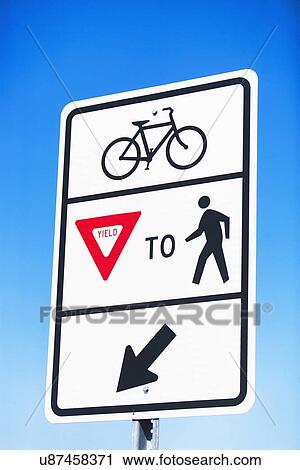 Stock Image - Information sign on clear sky. Fotosearch