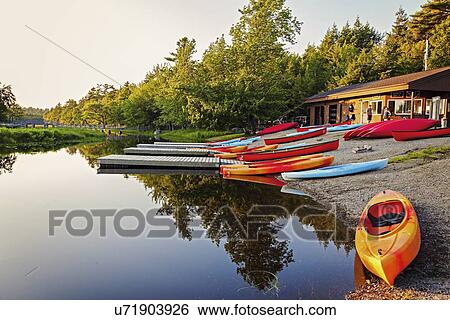 Kayaks on lakeshore View Large Photo Image Stock Photograph - Kayaks on lakeshore. Fotosearch
