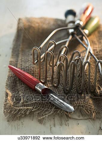 Kitchen utensils on jute View Large Photo Image Stock Image - Kitchen utensils on jute. Fotosearch