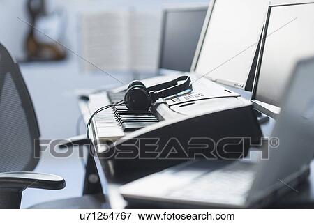 Laptop and synth in recording studio View Large Photo Image Stock Photo - Laptop and synth in recording studio. Fotosearch