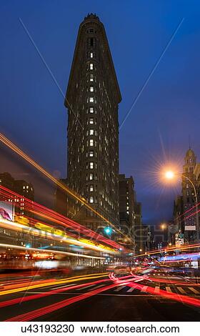 Stock Image - Light trails on city street. Fotosearch