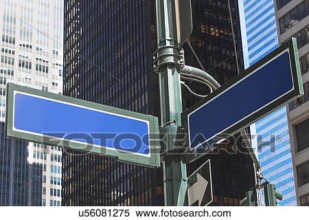 Low angle view of information signs View Large Photo Image Stock Photography - Low angle view of information signs. Fotosearch