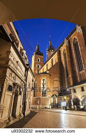 Low angle view of St. Mary's Church and St. Barbara Church from under passage arch View Large Photo Image Stock Image - Low angle view of St. Mary's Church and St. Barbara Church from under passage arch. Fotosearch