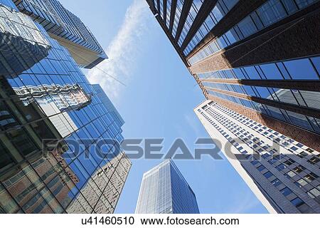 Low angle view of tall buildings View Large Photo Image Stock Image - Low angle view of tall buildings. Fotosearch