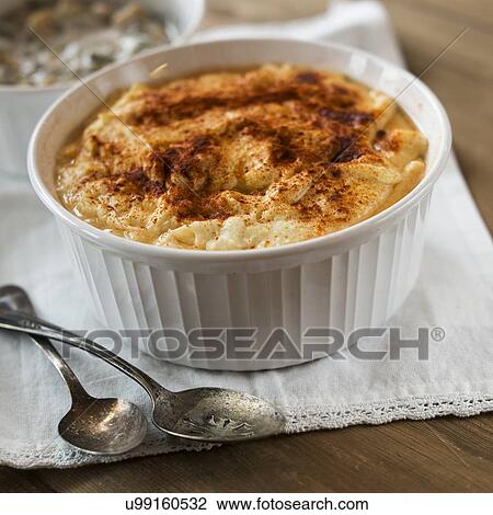Macaroni and cheese on wood View Large Photo Image Stock Image - Macaroni and cheese on wood. Fotosearch