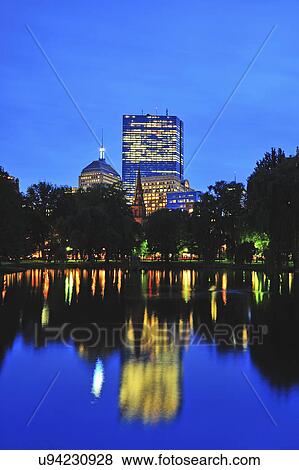 Office building reflecting in pond in Public Gardens at dusk View Large Photo Image Stock Photo - Office building reflecting in pond in Public Gardens at dusk. Fotosearch