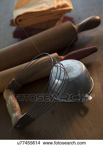 Picture - Old fashioned kitchen utensils on wood. Fotosearch