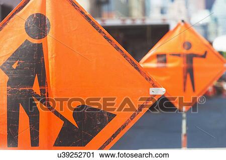 Orange road signs View Large Photo Image Stock Image - Orange road signs. Fotosearch