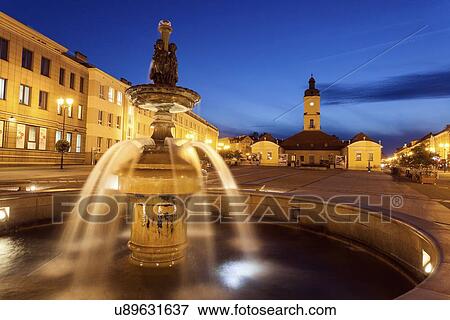 Poland, Podlaskie, Bialostok Fountain on illuminated town square View Large Photo Image Stock Photo - Poland, Podlaskie, Bialostok Fountain on illuminated town square. Fotosearch