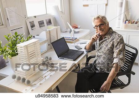 Portrait of architect in his office View Large Photo Image Stock Image - Portrait of architect in his office. Fotosearch