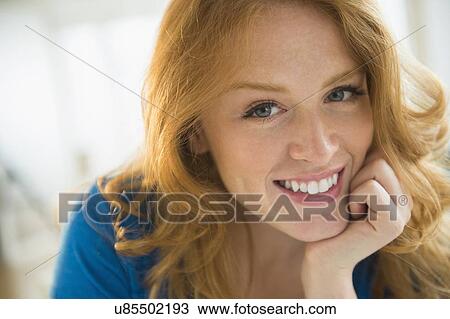 Stock Image - Portrait of attractive woman. Fotosearch
