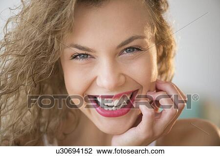 Portrait of attractive young woman laughing View Large Photo Image Stock Image - Portrait of attractive young woman laughing. Fotosearch