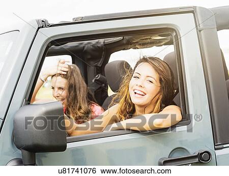 Portrait of female friends (14-15) during road trip View Large Photo Image Stock Photograph - Portrait of female friends (14-15) during road trip. Fotosearch