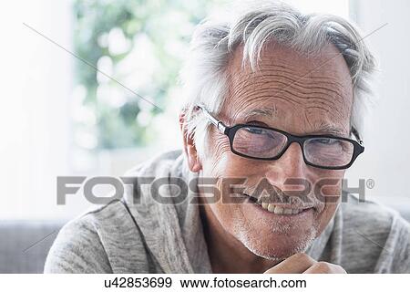 Portrait of smiling senior man View Large Photo Image Stock Photo - Portrait of smiling senior man. Fotosearch