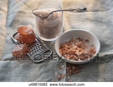 Rock salt, grater, bowl and glass on cloth View Large Photo Image Stock Image - Rock salt, grater, bowl and glass on cloth. Fotosearch