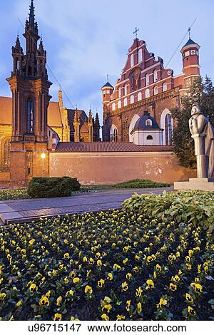Stock Photo - Saint Ann and Bernardine Churches at evening, flowers in foreground. Fotosearch