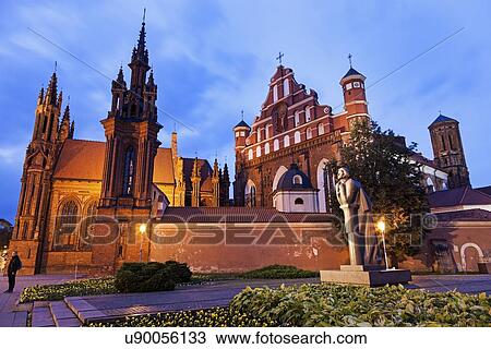 Stock Image - St. Ann and St. Bernardine Churches against evening sky. Fotosearch