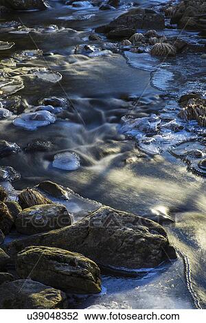 Stock Image - Stream in winter. Fotosearch