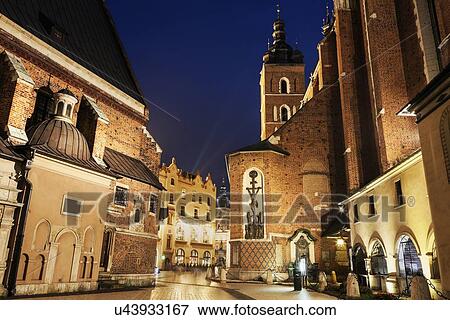 Street-level view of illuminated St. Barbara Church View Large Photo Image Stock Photo - Street-level view of illuminated St. Barbara Church. Fotosearch