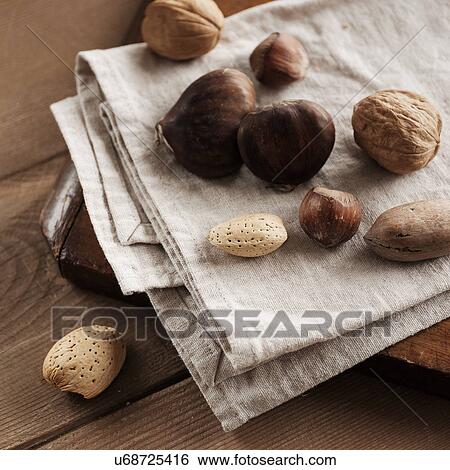 Studio shot of nuts View Large Photo Image Stock Photograph - Studio shot of nuts. Fotosearch