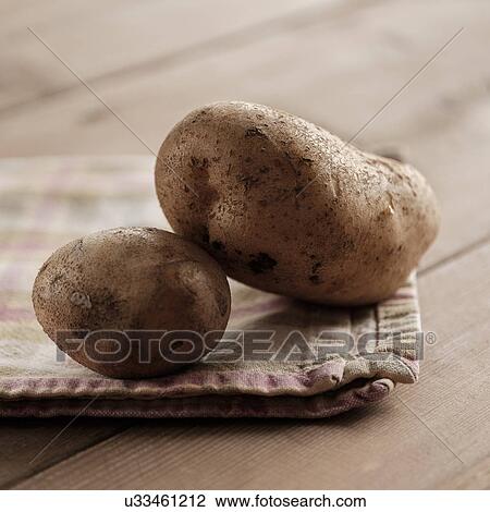 Studio shot of potatoes View Large Photo Image Stock Image - Studio shot of potatoes. Fotosearch