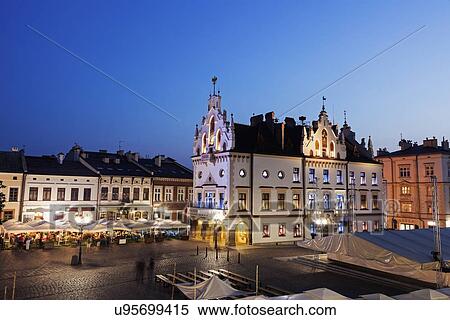 Stock Photography - Town hall on main square at night. Fotosearch
