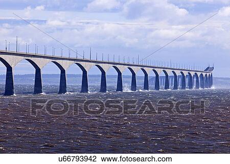 View of long concrete bridge over strait View Large Photo Image Stock Image - View of long concrete bridge over strait. Fotosearch