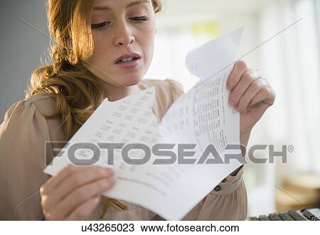 View of woman ripping documents View Large Photo Image Stock Image - View of woman ripping documents. Fotosearch