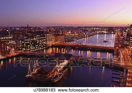 Stock Image - View over Fort Point Channel at dusk. Fotosearch