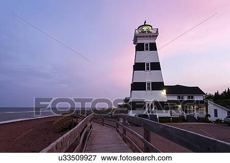 West Point Lighthouse and sandy beach at dusk View Large Photo Image Stock Photo - West Point Lighthouse and sandy beach at dusk. Fotosearch