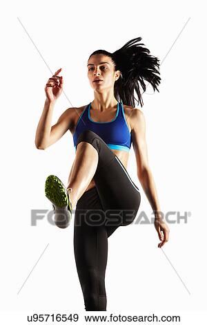 Stock Photo - Athlete running in place. Fotosearch