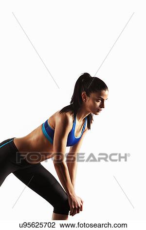 Athlete stretching in lunge View Large Photo Image Stock Image - Athlete stretching in lunge. Fotosearch