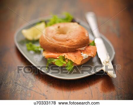 Bagel with Scottish smoked salmon and cream cheese View Large Photo Image Stock Photo - Bagel with Scottish smoked salmon and cream cheese. Fotosearch