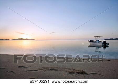 Boat in still ocean View Large Photo Image Stock Image - Boat in still ocean. Fotosearch