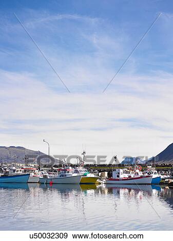 Stock Photo - Boats docked in harbor. Fotosearch
