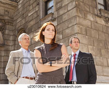 Picture - Business people standing together. Fotosearch