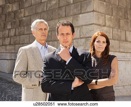 Business people standing together View Large Photo Image Stock Image - Business people standing together. Fotosearch