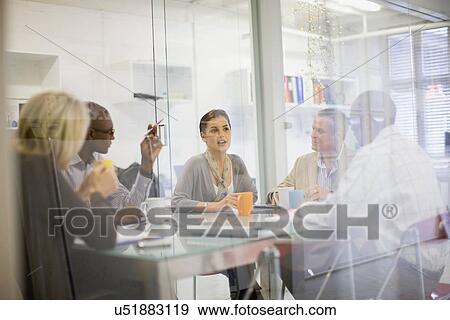 Business people talking in meeting View Large Photo Image Stock Photo - Business people talking in meeting. Fotosearch